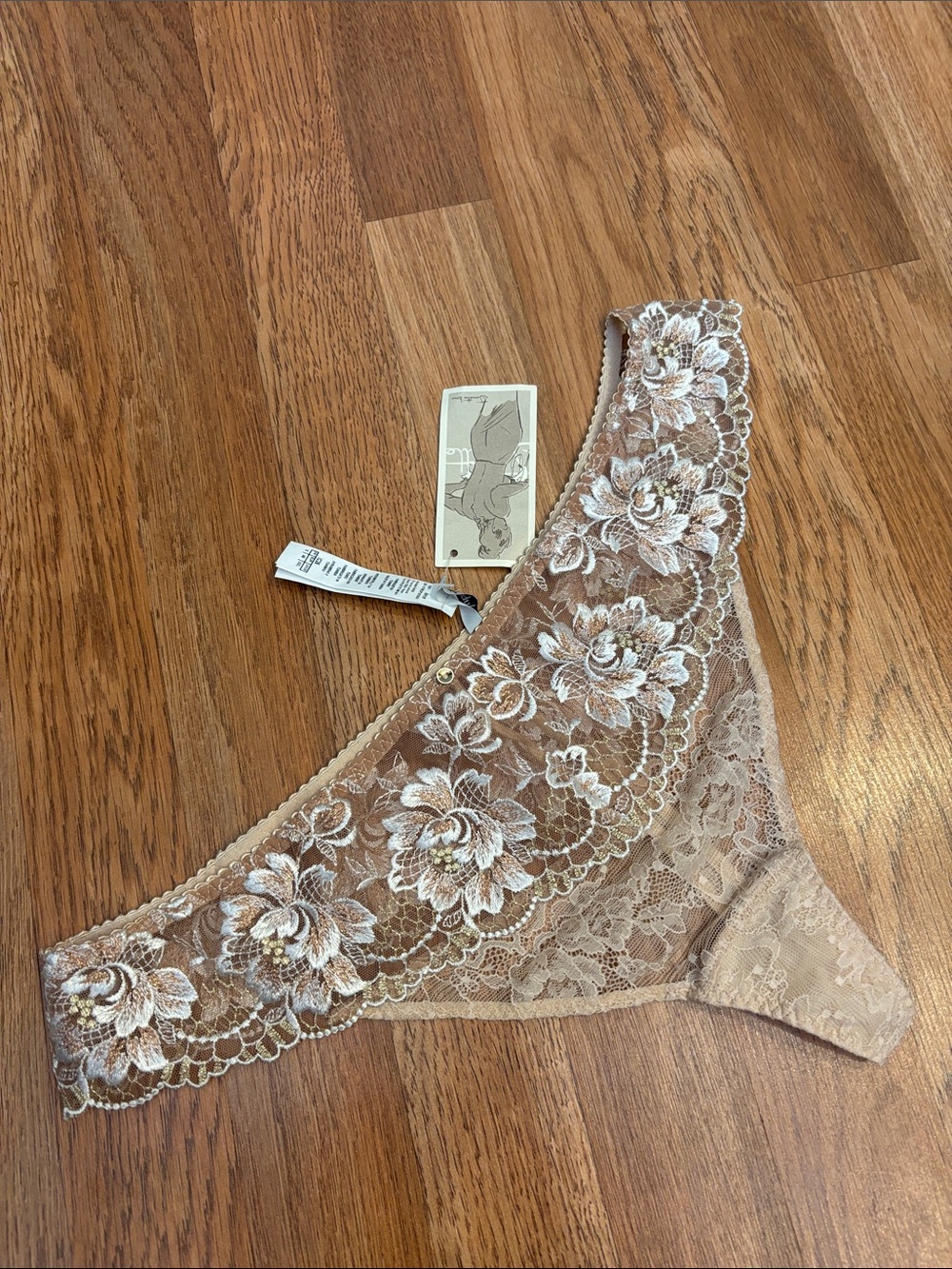 Aubade beige embroidered floral lace thong. Size 2X.